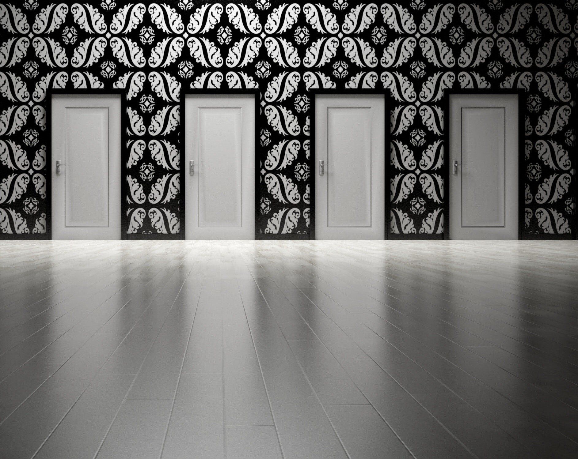 Four white doors in a row against black patterned wallpaper on a gray floor