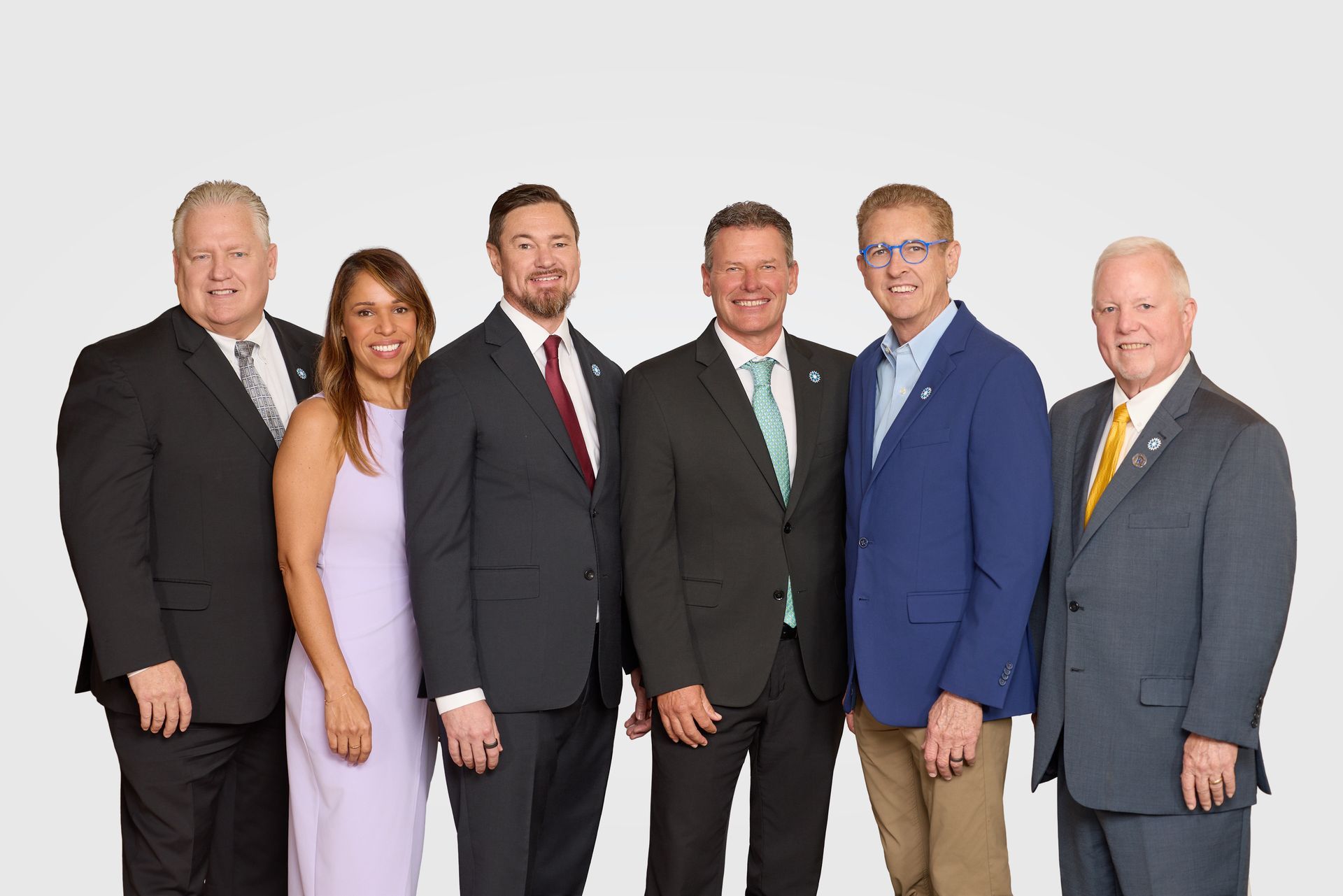 A group of people are posing for a picture together.