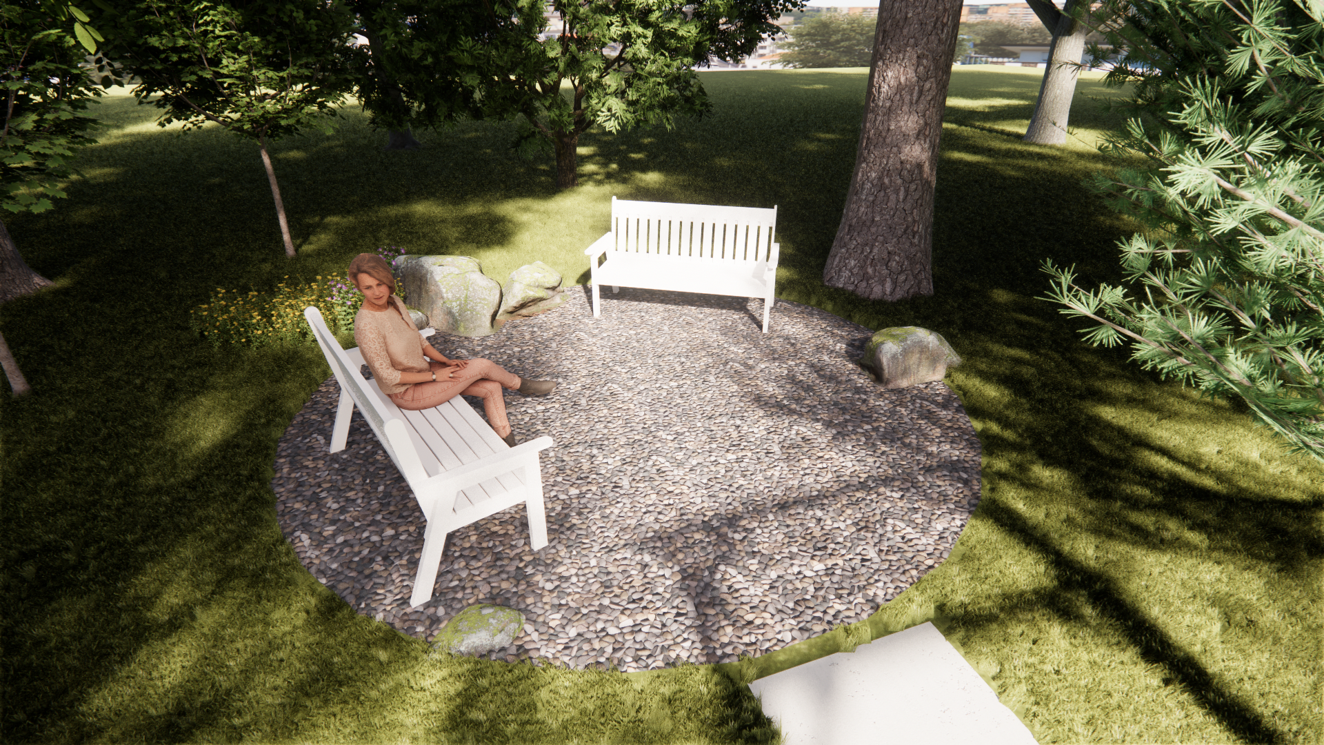 Person sitting on a white bench in a shaded park beside a gravel circle and trees