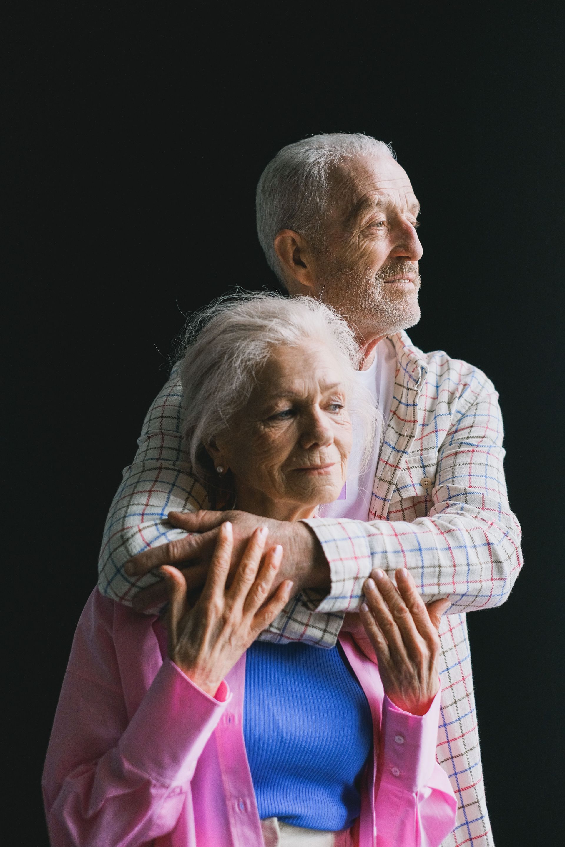 A caregiver providing compassionate support to an older adult