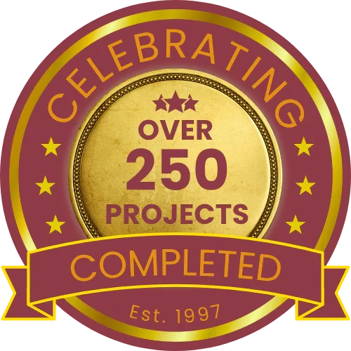 Emblem: Celebrating over 250 completed projects since 1997. Maroon and gold.