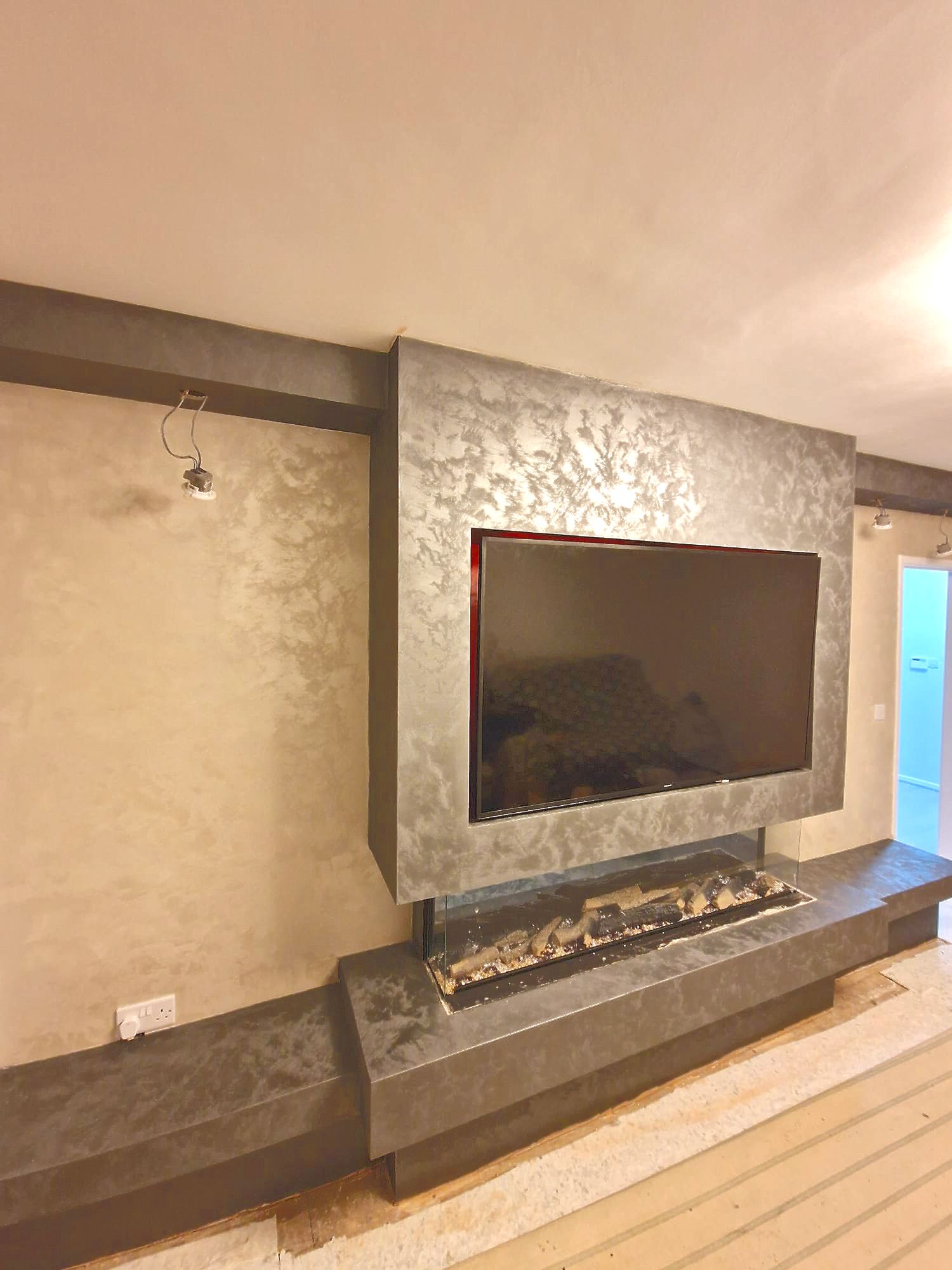 Bedroom with wallpaper, bed and cocktails on tray