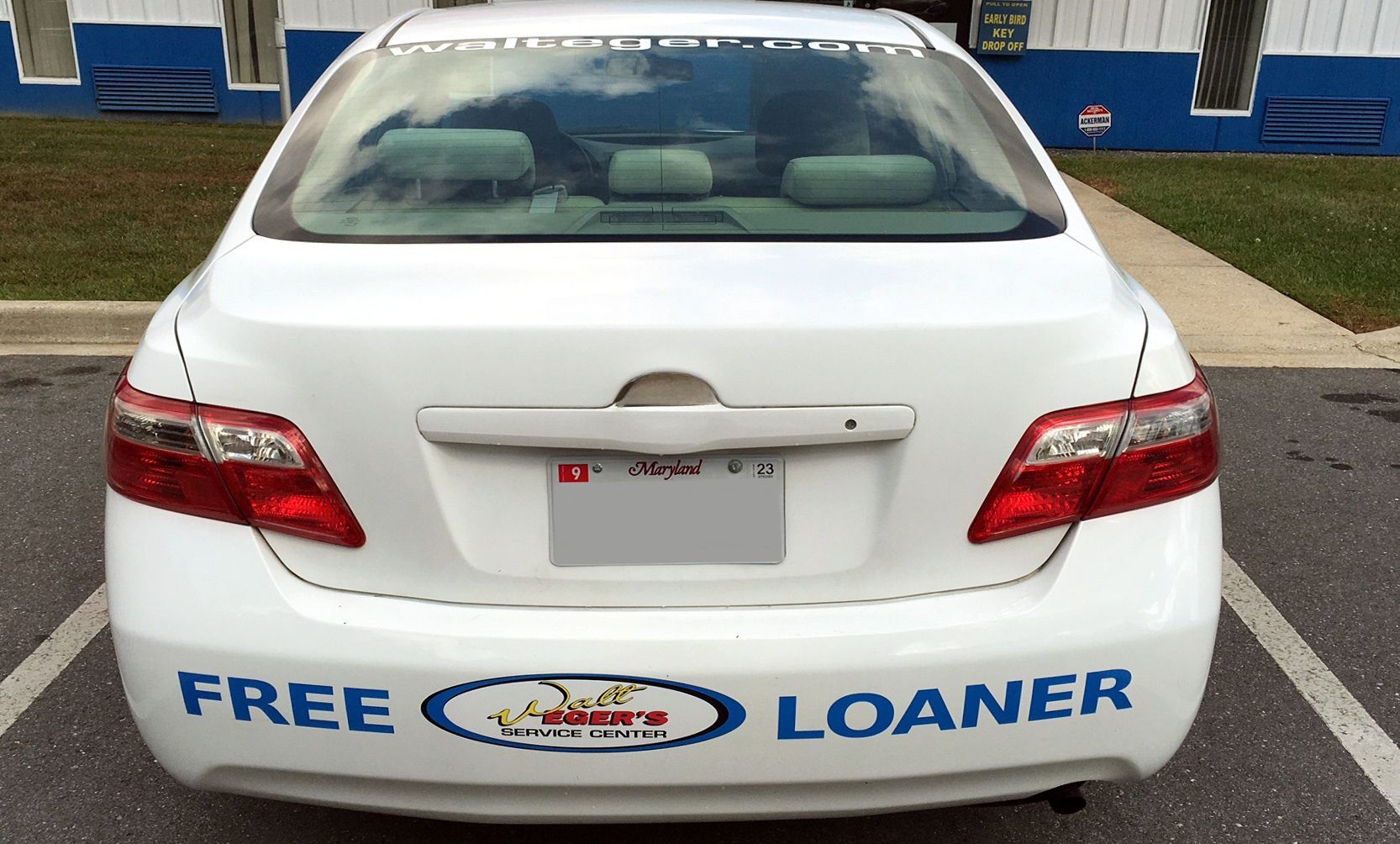 Rear view of a white Toyota | Walt Eger's Service Center
