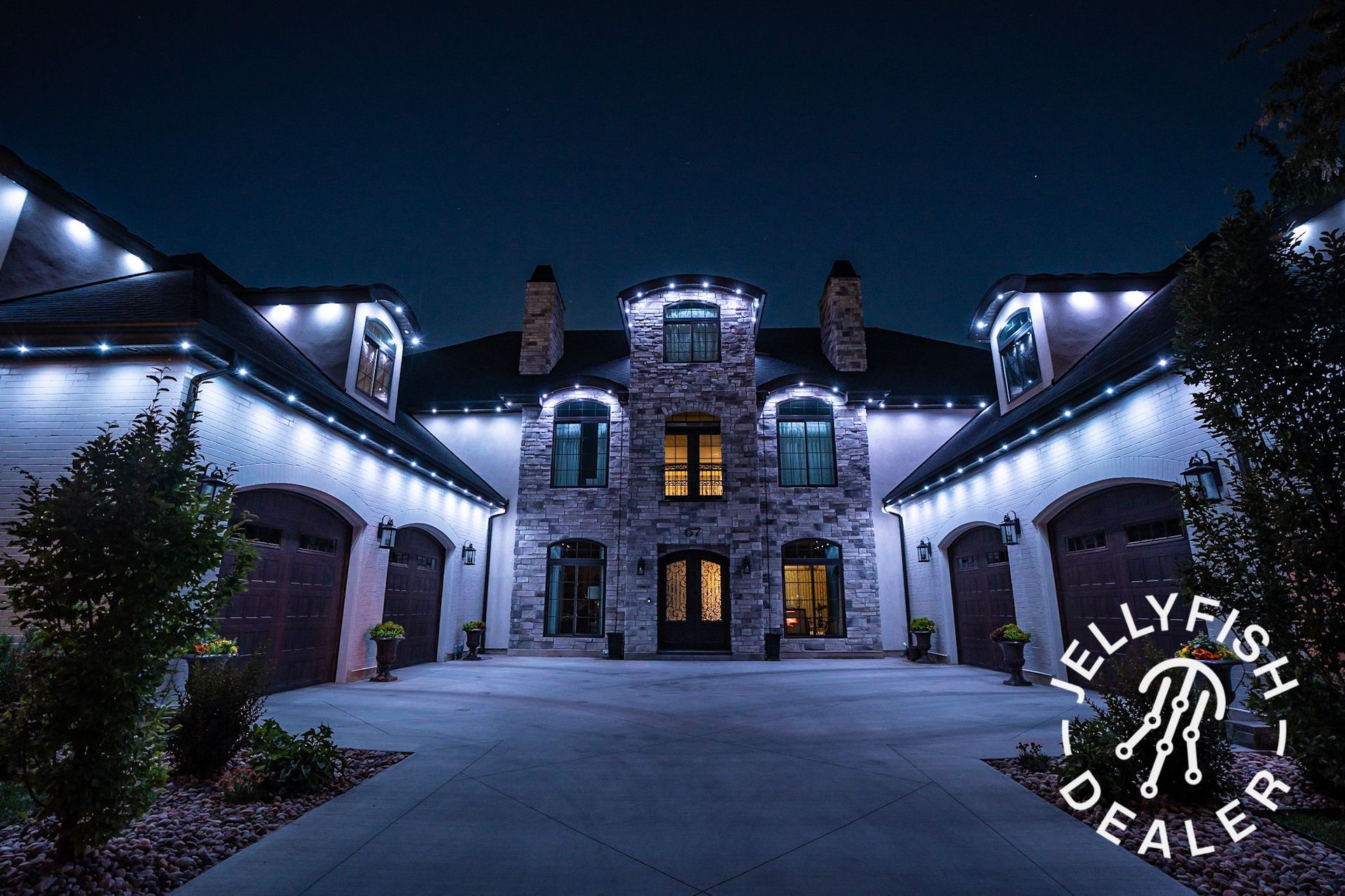 A large house with a lot of lights on it
