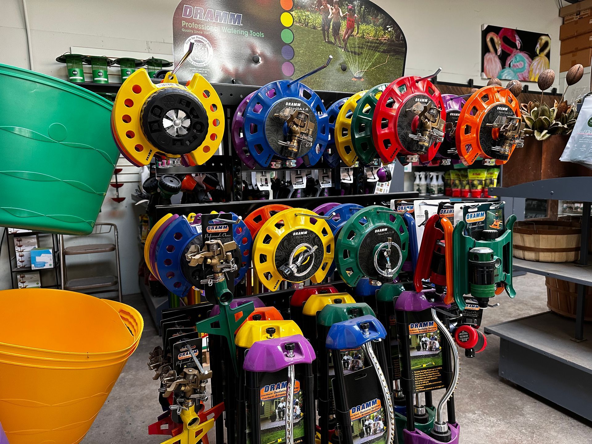 A bunch of hose reels are on display in a store