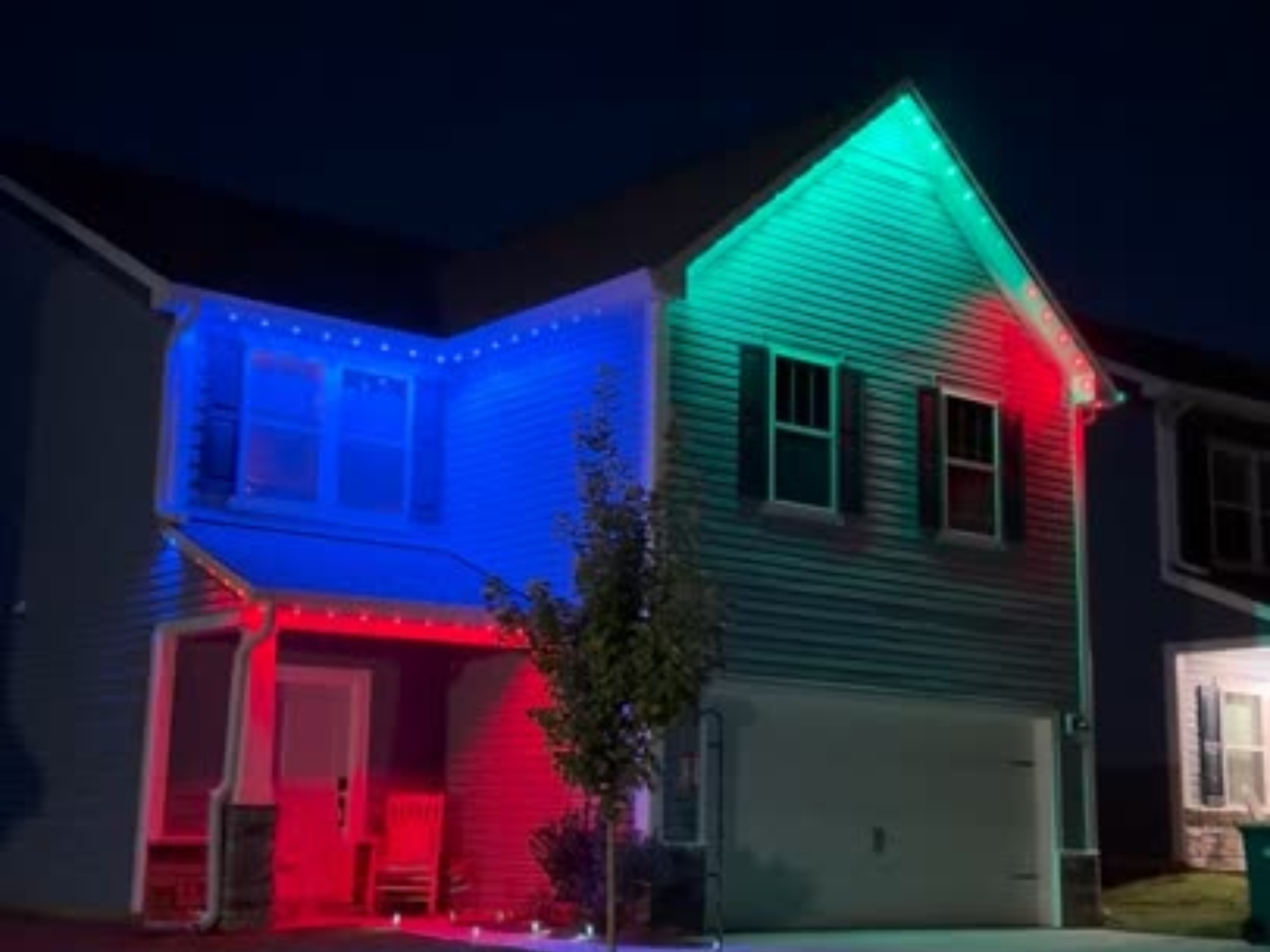 Permanent soffit lighting glowing at night