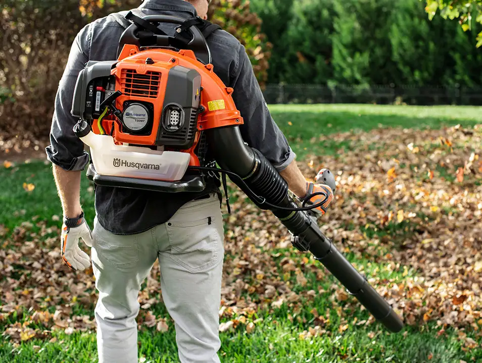 Man using Husqvarna Backpack Leaf Blower