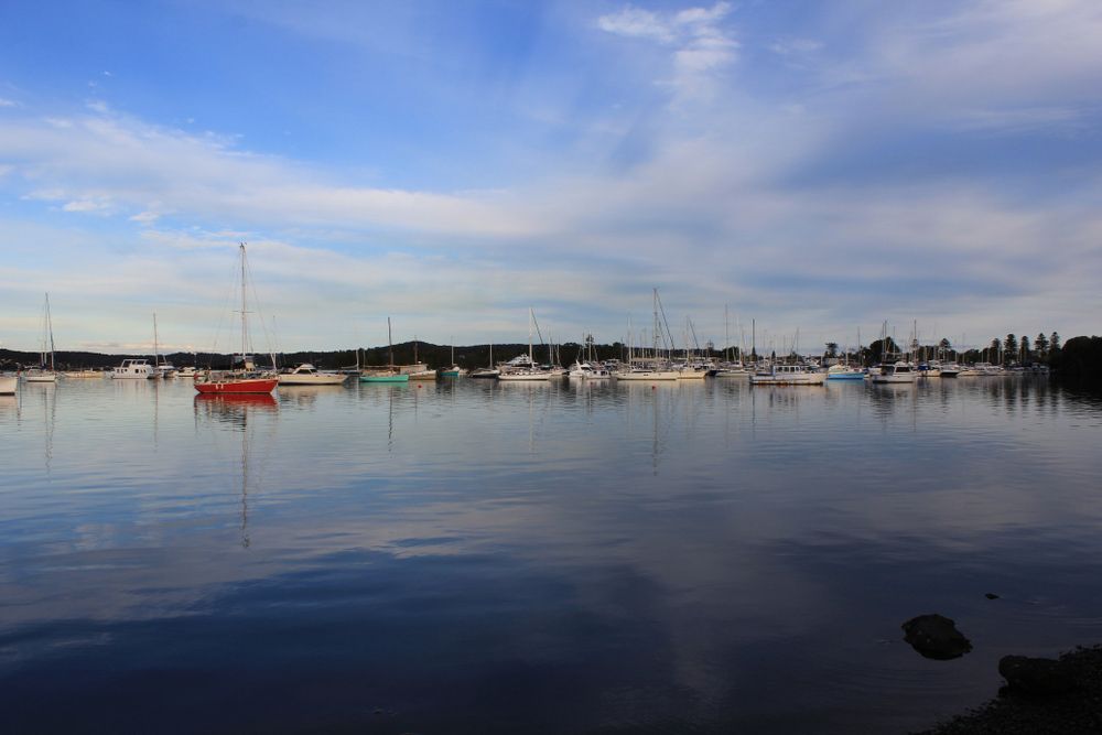 A Row Of Boats Are Docked In A Harbor On A Sunny Day โ MINXxx Sensual Erotic Boutique in Central Coast, NSW