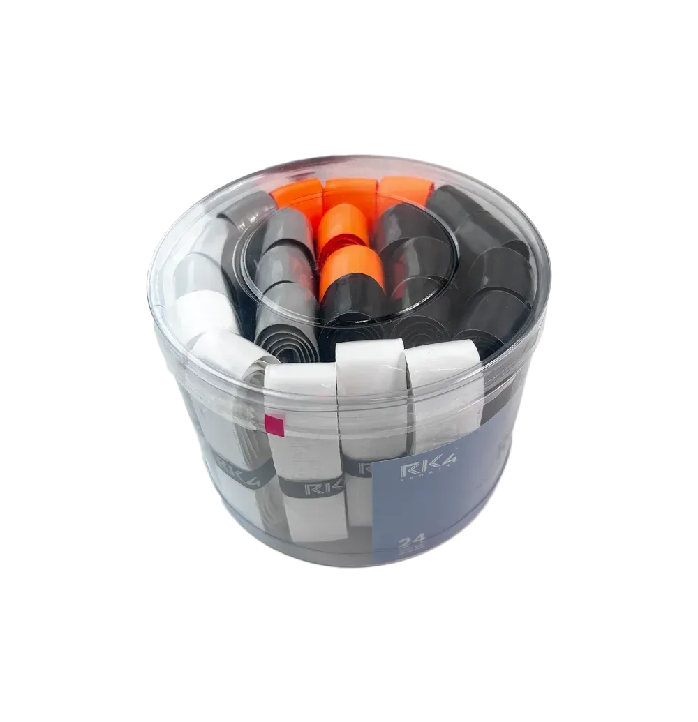A clear plastic container filled with tennis racket grip tapes of various colors: white, black, gray, and orange.