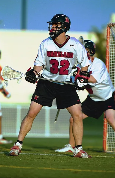 Picture of Coach  Carrington King playing lacrosse in college at University of Maryland