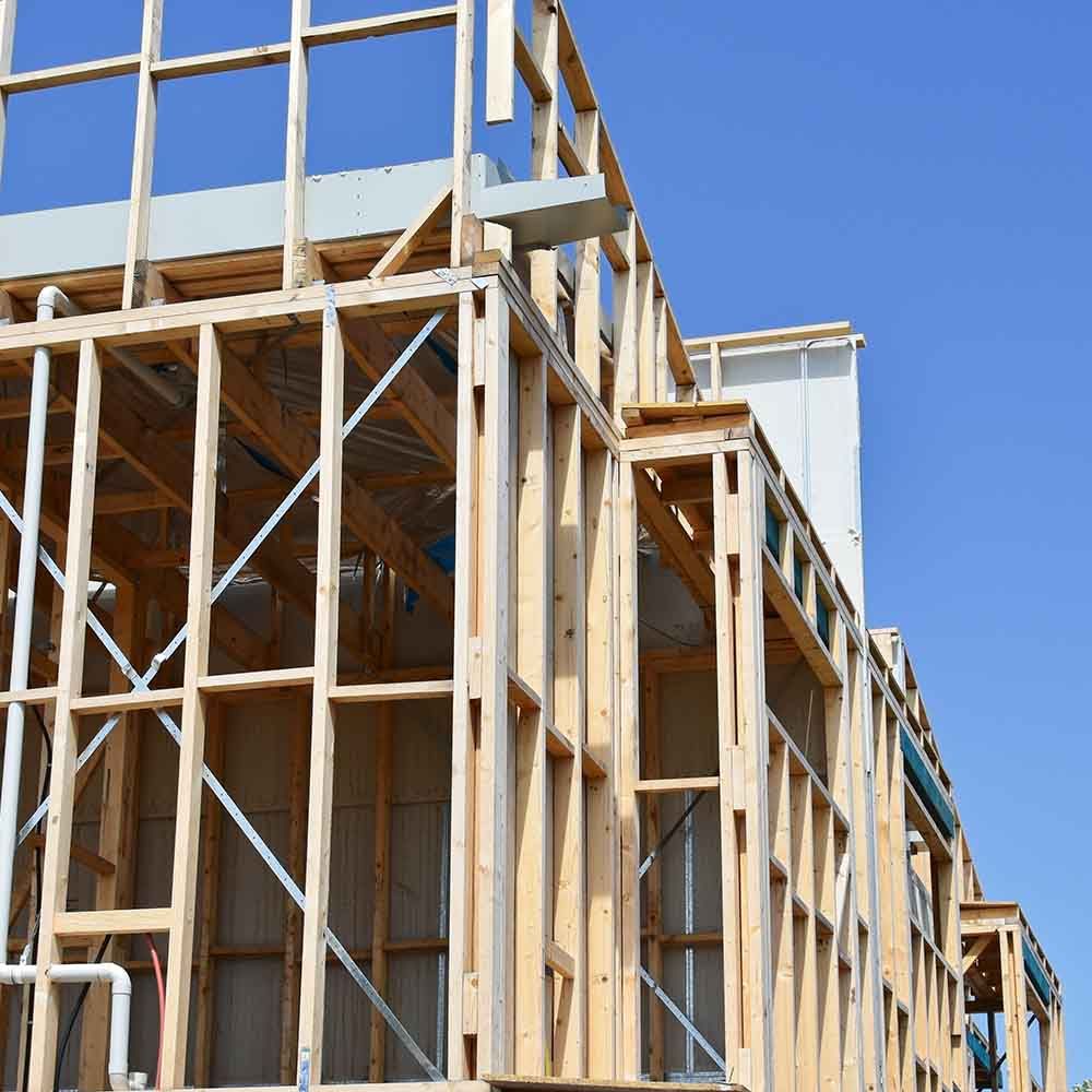 A building under construction with pine wood products.