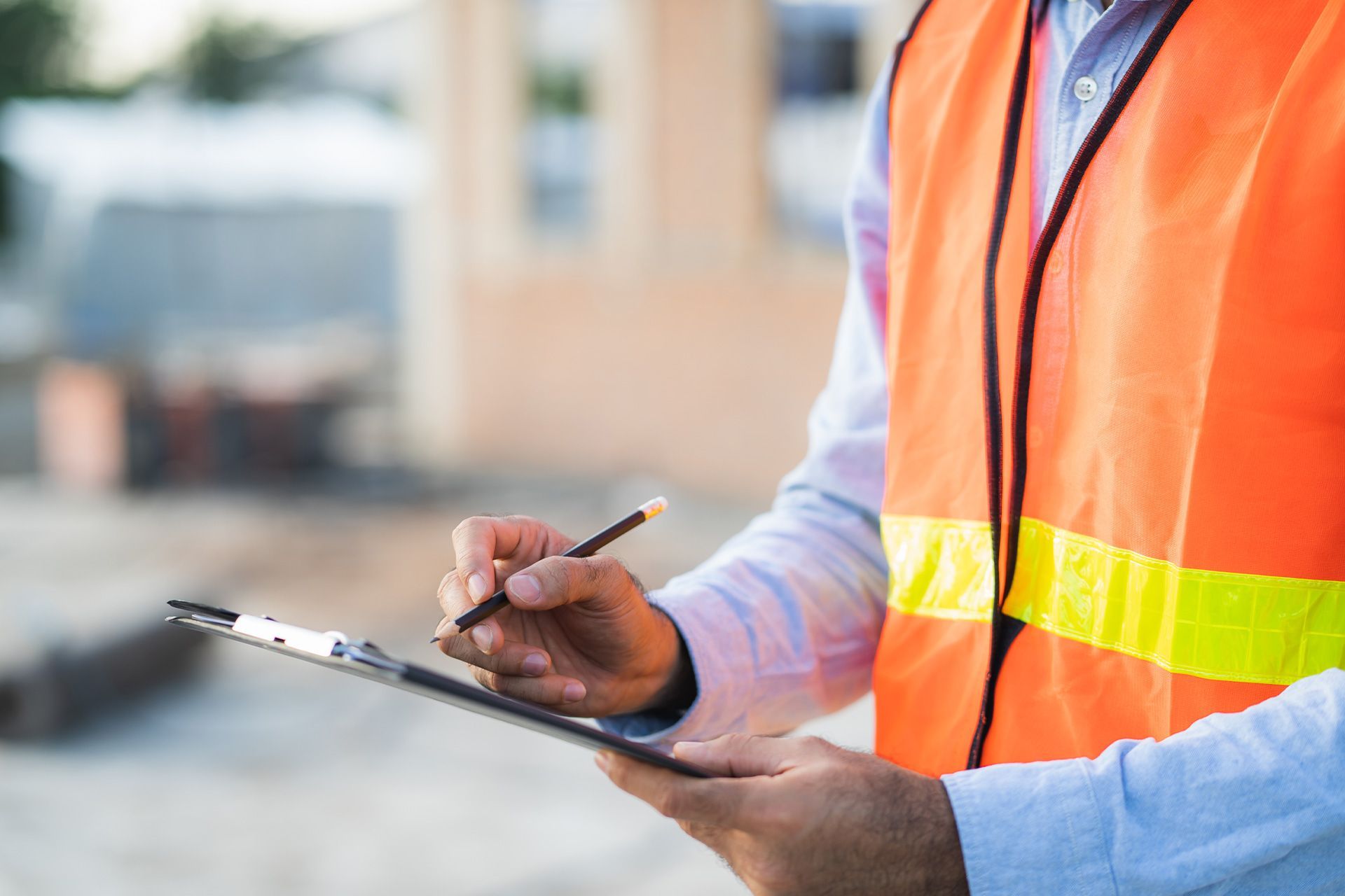 Professional home inspector evaluating property conditions