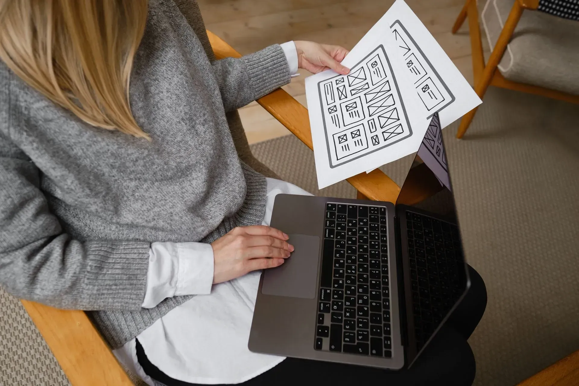 a woman looking at landing page designs