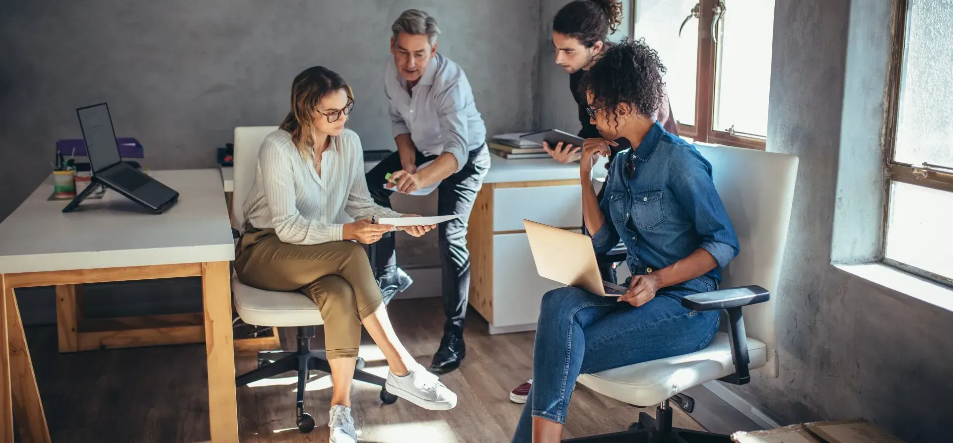 a group of professionals having a discussion
