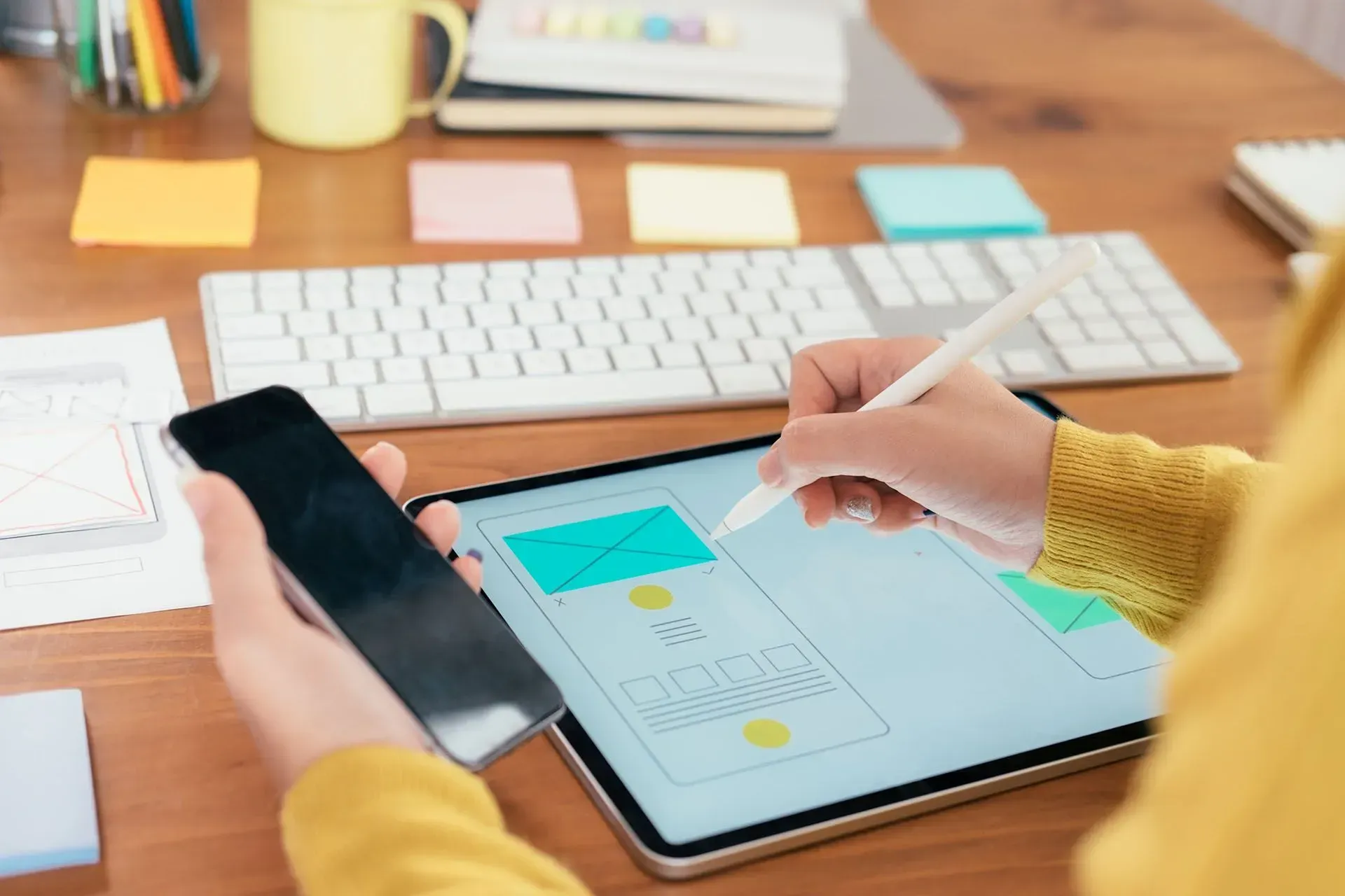 Woman Creating Mobile-First Website Design