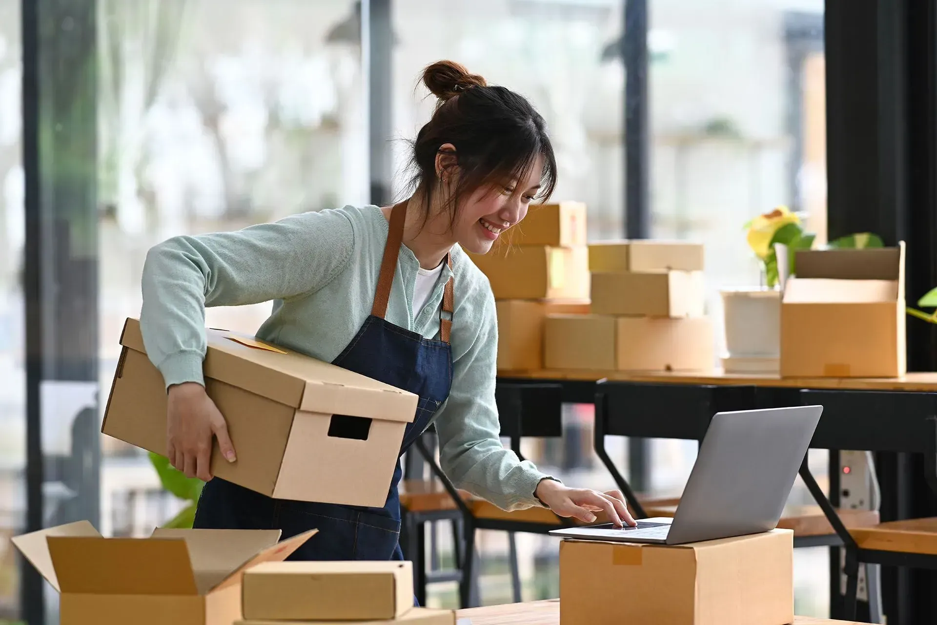 happy woman using a laptop