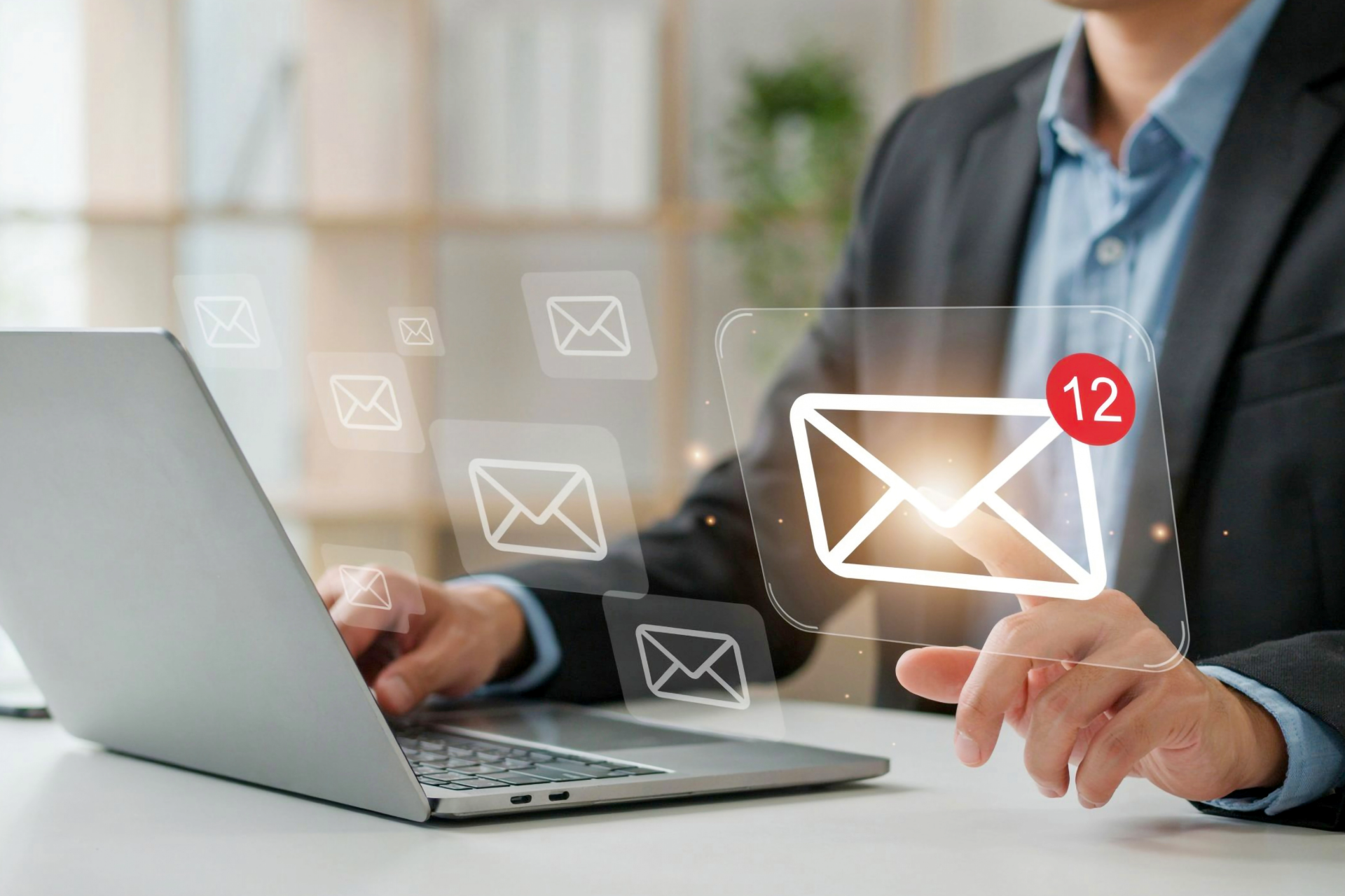 Business owner reviewing emails on a laptop