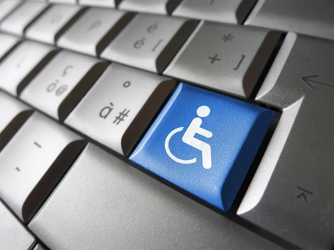 disability symbol on laptop key