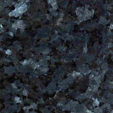 Close-up of dark gray and blue speckled stone or granite texture