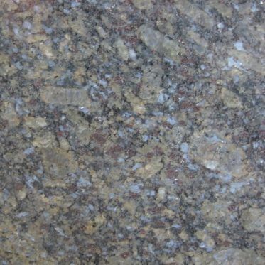Close-up of a speckled gray, brown, and beige stone surface