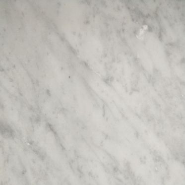 Close-up of light gray marble with subtle white veining
