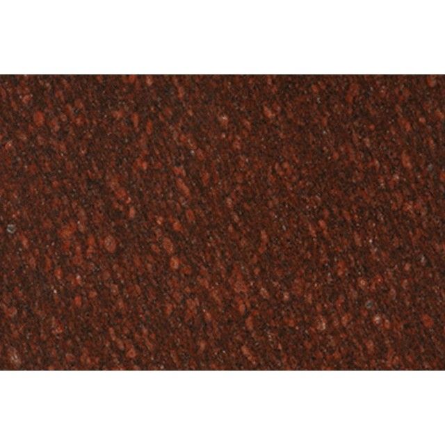 Close-up of a textured reddish-brown surface with a mottled pattern