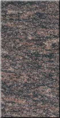 Close-up of a mottled gray and pink textured stone surface
