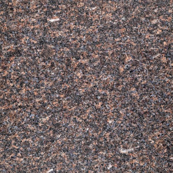 Close-up of a speckled brown and gray granite surface.