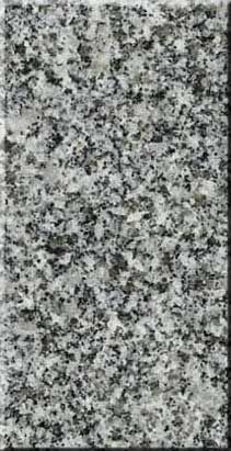 Gray speckled granite surface with black and white flecks