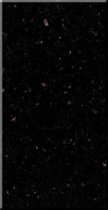 Dark starry background with scattered faint specks and a small bright object near the top.