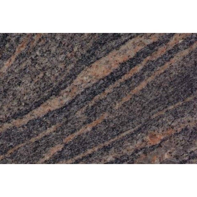 Close-up of dark gray stone with pink and tan diagonal veins
