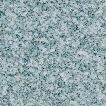 Mottled gray-green stone surface with a speckled texture