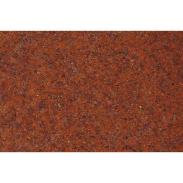 Close-up of a rusty orange-brown textured metal surface