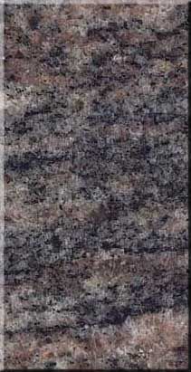 Close-up of a speckled gray, pink, and black stone or textured surface.