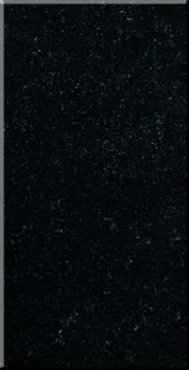 Dark, speckled textured surface with a black center and gray edges