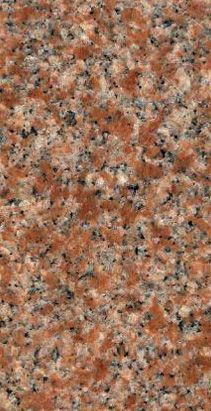 Close-up of speckled red, black, and white granite texture