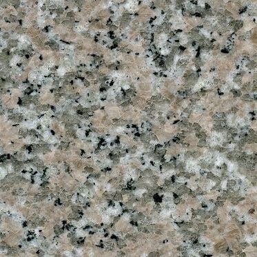 Speckled granite surface with pink, gray, black, and white flecks