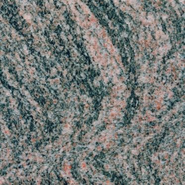 Pink and gray speckled stone surface with wavy veins