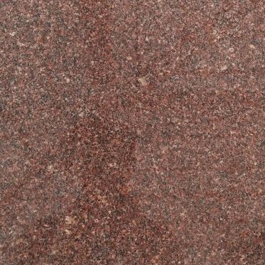 Abstract reddish-brown textured pattern with a dark cross-like shape in the center