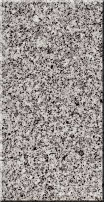 Speckled gray granite slab with black and white flecks