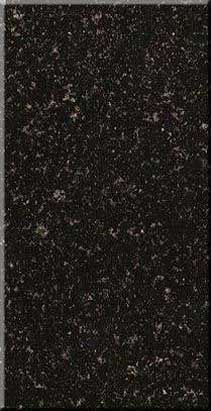 Dark speckled black-and-gray textured surface with a narrow lighter border on the left edge