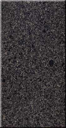 Dark gray speckled static texture with a faint vertical shadow and a small dark spot on the right