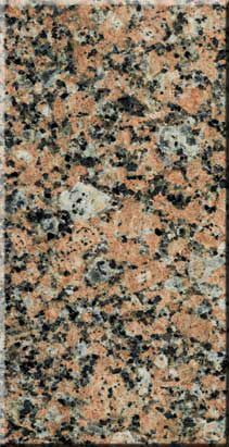 Close-up of a pink and black speckled granite surface