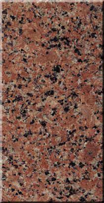 Pink and black speckled granite surface texture