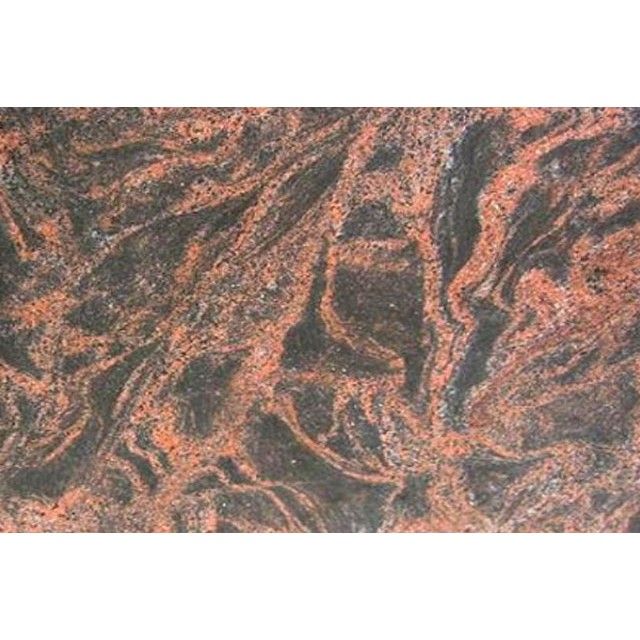 Abstract marbled texture with pink, black, and gray swirling veins