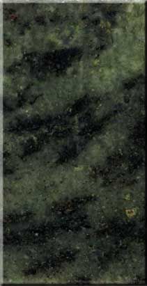 Close-up of a dark green and black mottled textured surface