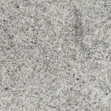 Close-up of gray speckled stone or granite surface
