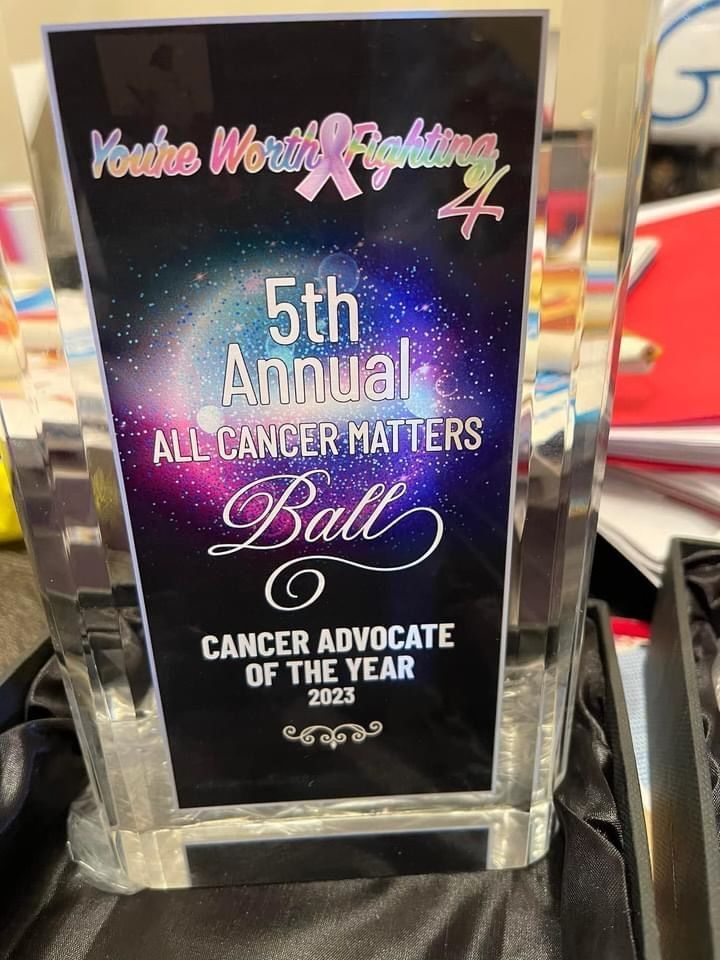 Crystal award plaque for the 5th Annual All Cancer Matters Ball, reading “Cancer Advocate of the Year.”