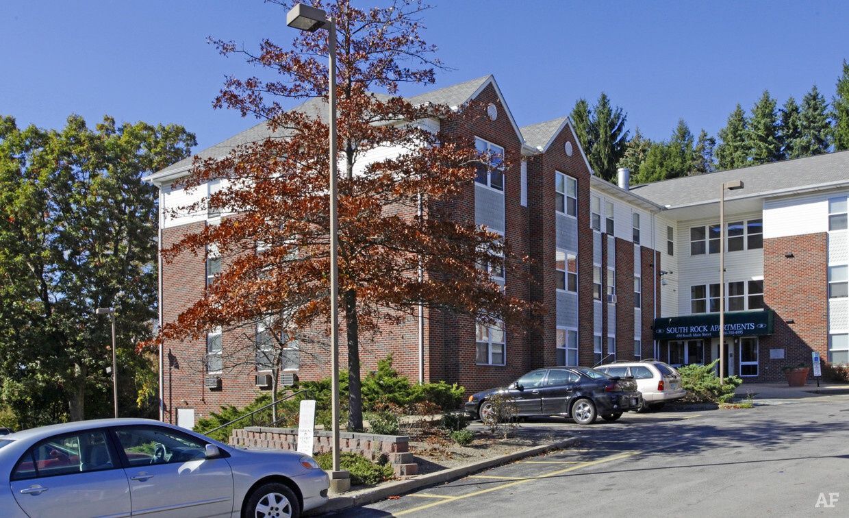 A large brick apartment building.