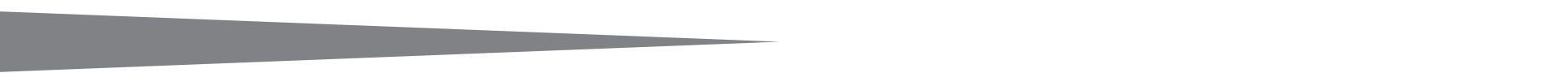 A dark gray, rectangular shape, with subtle shading, appears against a white background.